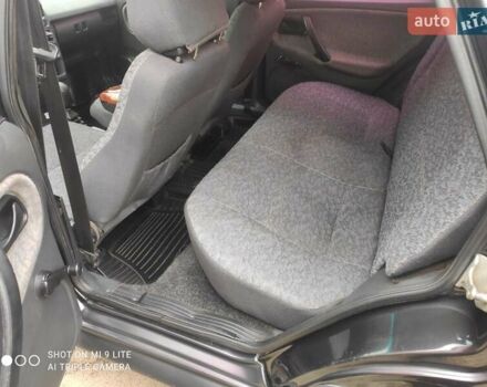 Черный ВАЗ 21099, объемом двигателя 1.6 л и пробегом 251 тыс. км за 2650 $, фото 5 на Automoto.ua