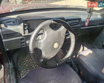 Красный ВАЗ 21099, объемом двигателя 1.3 л и пробегом 230 тыс. км за 600 $, фото 4 на Automoto.ua