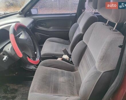 ВАЗ 21099 2007 в Каменке на Automoto.ua Красный ВАЗ 21099, объемом двигателя 1.6 л и пробегом 215 тыс. км за 2100 $, фото 9 на Automoto.ua