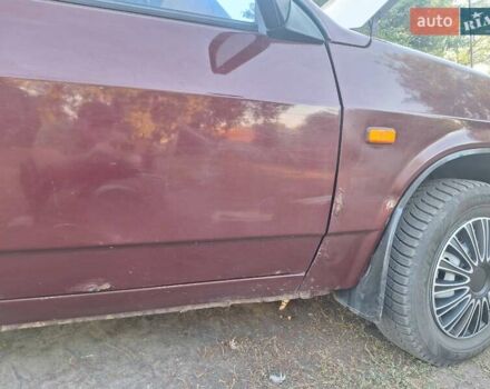 Красный ВАЗ 21099, объемом двигателя 1.6 л и пробегом 157 тыс. км за 2000 $, фото 2 на Automoto.ua