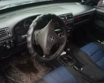 Серый ВАЗ 21099, объемом двигателя 1.5 л и пробегом 150 тыс. км за 2000 $, фото 4 на Automoto.ua