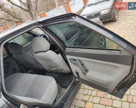 Черный ВАЗ 2110, объемом двигателя 1.6 л и пробегом 250 тыс. км за 1499 $, фото 4 на Automoto.ua