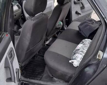 Черный ВАЗ 2110, объемом двигателя 1.62 л и пробегом 194 тыс. км за 2000 $, фото 1 на Automoto.ua