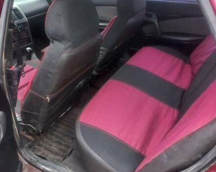 Красный ВАЗ 2110, объемом двигателя 1.5 л и пробегом 350 тыс. км за 2126 $, фото 4 на Automoto.ua