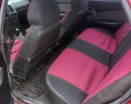 Красный ВАЗ 2110, объемом двигателя 1.5 л и пробегом 350 тыс. км за 2126 $, фото 5 на Automoto.ua