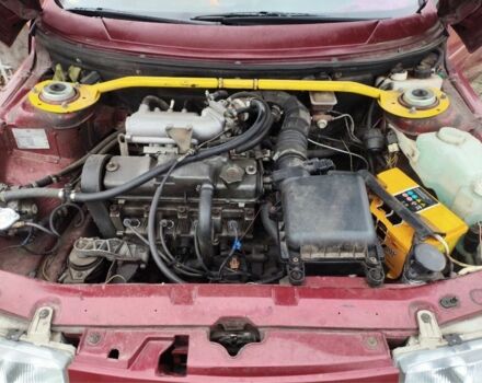 Красный ВАЗ 2110, объемом двигателя 1.5 л и пробегом 320 тыс. км за 2000 $, фото 6 на Automoto.ua