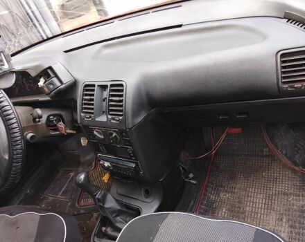 Красный ВАЗ 2110, объемом двигателя 1 л и пробегом 2 тыс. км за 1200 $, фото 3 на Automoto.ua