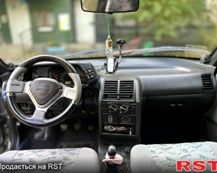 Серый ВАЗ 2110, объемом двигателя 1.6 л и пробегом 199 тыс. км за 2000 $, фото 4 на Automoto.ua