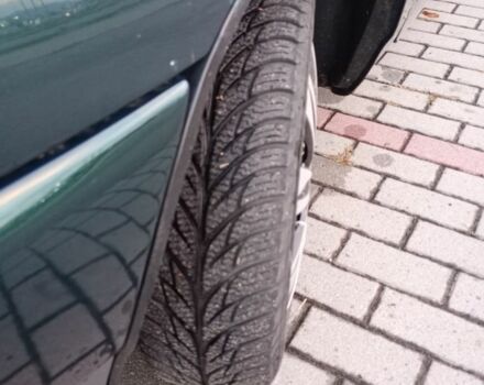 Зеленый ВАЗ 2110, объемом двигателя 1 л и пробегом 300 тыс. км за 1400 $, фото 4 на Automoto.ua