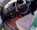 Зеленый ВАЗ 2110, объемом двигателя 1.5 л и пробегом 400 тыс. км за 1200 $, фото 3 на Automoto.ua