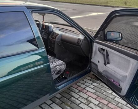 Зеленый ВАЗ 2110, объемом двигателя 1 л и пробегом 300 тыс. км за 1400 $, фото 5 на Automoto.ua