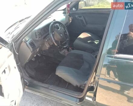 Зеленый ВАЗ 2110, объемом двигателя 1.5 л и пробегом 300 тыс. км за 1400 $, фото 4 на Automoto.ua