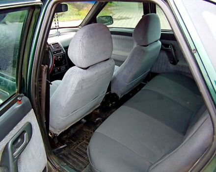 Зеленый ВАЗ 2110, объемом двигателя 1.5 л и пробегом 322 тыс. км за 2600 $, фото 5 на Automoto.ua