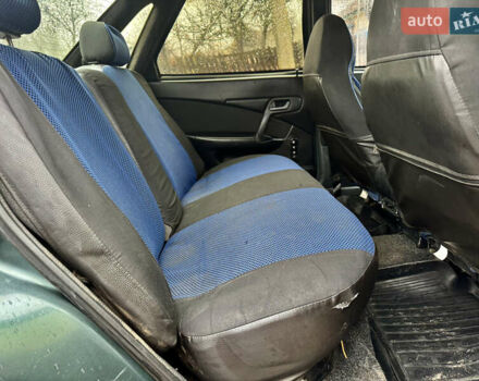 Зелений ВАЗ 2110, об'ємом двигуна 1.6 л та пробігом 200 тис. км за 1999 $, фото 11 на Automoto.ua