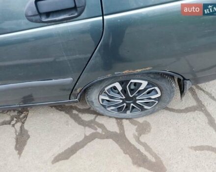 Зеленый ВАЗ 2110, объемом двигателя 1.6 л и пробегом 304 тыс. км за 1416 $, фото 7 на Automoto.ua