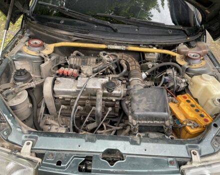 Зеленый ВАЗ 2110, объемом двигателя 1.6 л и пробегом 400 тыс. км за 1750 $, фото 3 на Automoto.ua