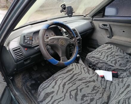 Зеленый ВАЗ 2110, объемом двигателя 1.6 л и пробегом 300 тыс. км за 1350 $, фото 4 на Automoto.ua