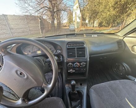 Чорний ВАЗ 21106, об'ємом двигуна 1.6 л та пробігом 77 тис. км за 1250 $, фото 6 на Automoto.ua