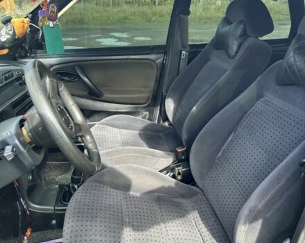 Черный ВАЗ 2111, объемом двигателя 1.5 л и пробегом 300 тыс. км за 1800 $, фото 6 на Automoto.ua