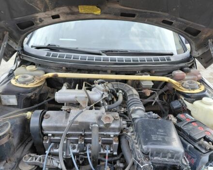 Черный ВАЗ 2111, объемом двигателя 1.5 л и пробегом 179 тыс. км за 1200 $, фото 7 на Automoto.ua