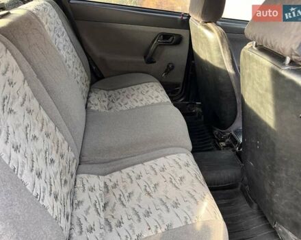 Черный ВАЗ 2111, объемом двигателя 1.6 л и пробегом 258 тыс. км за 1500 $, фото 4 на Automoto.ua