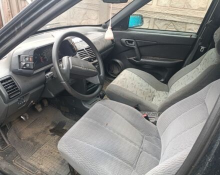 Черный ВАЗ 2111, объемом двигателя 1.6 л и пробегом 200 тыс. км за 750 $, фото 2 на Automoto.ua