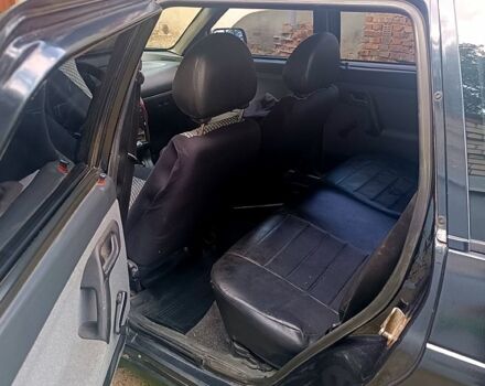 Черный ВАЗ 2111, объемом двигателя 1.6 л и пробегом 206 тыс. км за 1900 $, фото 3 на Automoto.ua