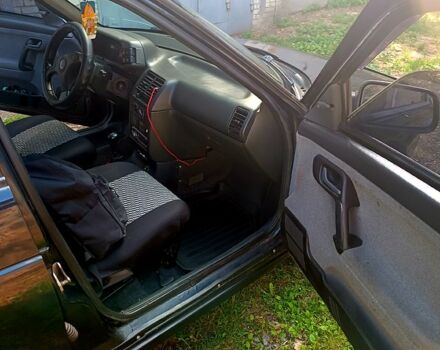 Черный ВАЗ 2111, объемом двигателя 1.6 л и пробегом 206 тыс. км за 1900 $, фото 4 на Automoto.ua