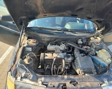 Черный ВАЗ 2111, объемом двигателя 1.5 л и пробегом 213 тыс. км за 1500 $, фото 11 на Automoto.ua