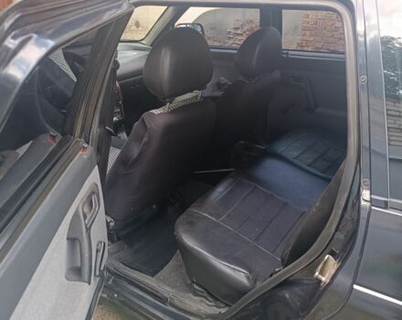 Черный ВАЗ 2111, объемом двигателя 1.6 л и пробегом 206 тыс. км за 1700 $, фото 4 на Automoto.ua