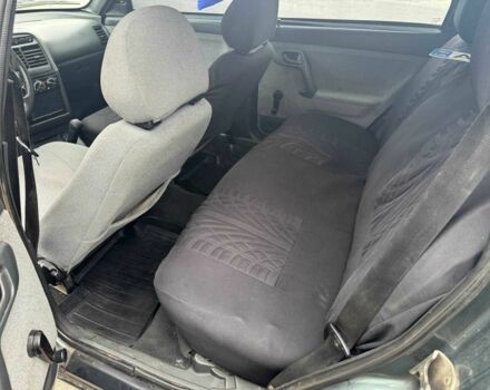 Черный ВАЗ 2111, объемом двигателя 1.5 л и пробегом 251 тыс. км за 850 $, фото 4 на Automoto.ua