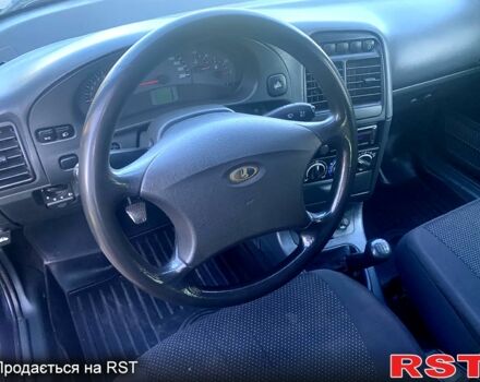 ВАЗ 2111 2012 в Полтаве на Automoto.ua Черный ВАЗ 2111, объемом двигателя 1.6 л и пробегом 184 тыс. км за 2700 $, фото 4 на Automoto.ua
