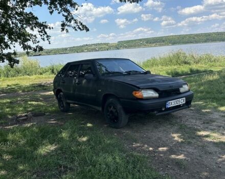 Черный ВАЗ 2111, объемом двигателя 1.5 л и пробегом 231 тыс. км за 605 $, фото 1 на Automoto.ua