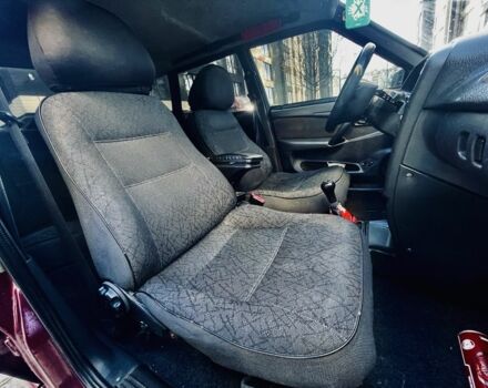 Красный ВАЗ 2111, объемом двигателя 1.5 л и пробегом 280 тыс. км за 1450 $, фото 6 на Automoto.ua