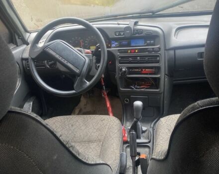 Красный ВАЗ 2111, объемом двигателя 1.5 л и пробегом 186 тыс. км за 600 $, фото 3 на Automoto.ua