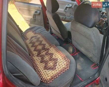 Красный ВАЗ 2111, объемом двигателя 1.5 л и пробегом 397 тыс. км за 1500 $, фото 4 на Automoto.ua