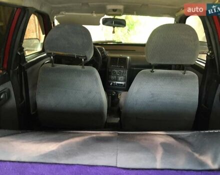 Красный ВАЗ 2111, объемом двигателя 1.5 л и пробегом 200 тыс. км за 1600 $, фото 4 на Automoto.ua