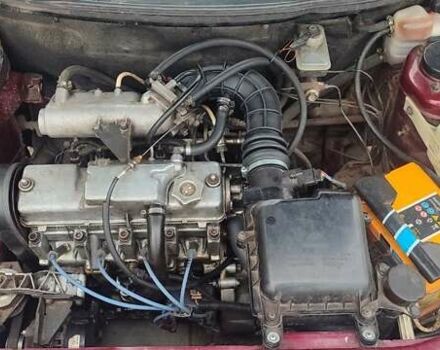 Красный ВАЗ 2111, объемом двигателя 1.5 л и пробегом 255 тыс. км за 2400 $, фото 2 на Automoto.ua