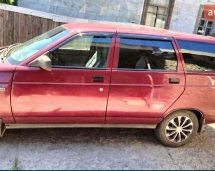 Красный ВАЗ 2111, объемом двигателя 1.5 л и пробегом 255 тыс. км за 2400 $, фото 1 на Automoto.ua