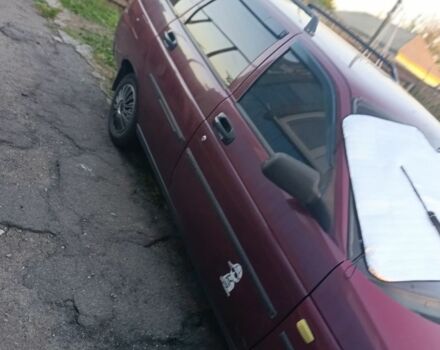 Красный ВАЗ 2111, объемом двигателя 1.6 л и пробегом 214 тыс. км за 1900 $, фото 2 на Automoto.ua