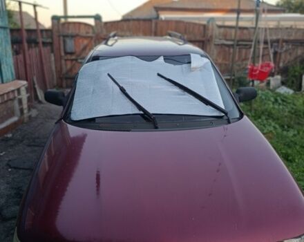 Красный ВАЗ 2111, объемом двигателя 1.6 л и пробегом 214 тыс. км за 1900 $, фото 1 на Automoto.ua