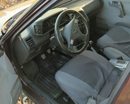 Красный ВАЗ 2111, объемом двигателя 1.6 л и пробегом 150 тыс. км за 1307 $, фото 4 на Automoto.ua