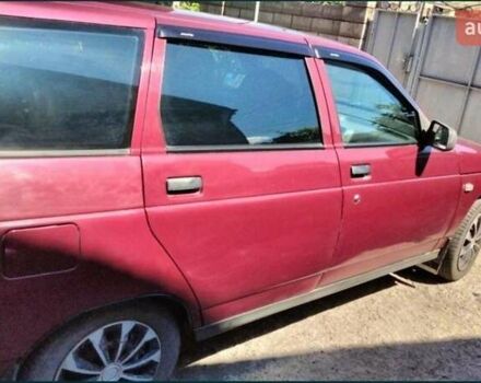 Красный ВАЗ 2111, объемом двигателя 1.5 л и пробегом 255 тыс. км за 2400 $, фото 1 на Automoto.ua