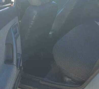 Серый ВАЗ 2111, объемом двигателя 1.5 л и пробегом 290 тыс. км за 2000 $, фото 7 на Automoto.ua