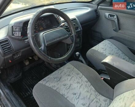 Серый ВАЗ 2111, объемом двигателя 1.5 л и пробегом 240 тыс. км за 999 $, фото 7 на Automoto.ua