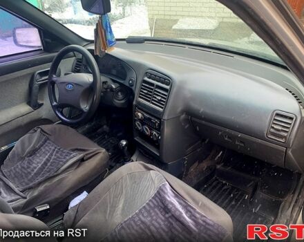 Серый ВАЗ 2111, объемом двигателя 1.6 л и пробегом 202 тыс. км за 1550 $, фото 6 на Automoto.ua