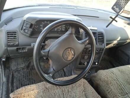 Серый ВАЗ 2111, объемом двигателя 1.5 л и пробегом 170 тыс. км за 1000 $, фото 1 на Automoto.ua