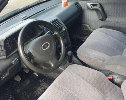 Синий ВАЗ 2111, объемом двигателя 1.5 л и пробегом 300 тыс. км за 1950 $, фото 7 на Automoto.ua