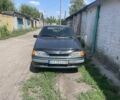 Зеленый ВАЗ 2111, объемом двигателя 1.5 л и пробегом 250 тыс. км за 1200 $, фото 1 на Automoto.ua