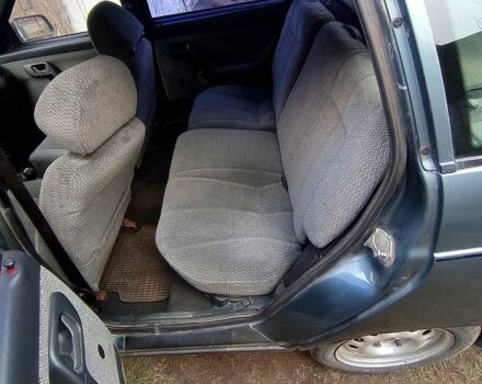 Зеленый ВАЗ 2111, объемом двигателя 1.5 л и пробегом 250 тыс. км за 750 $, фото 4 на Automoto.ua